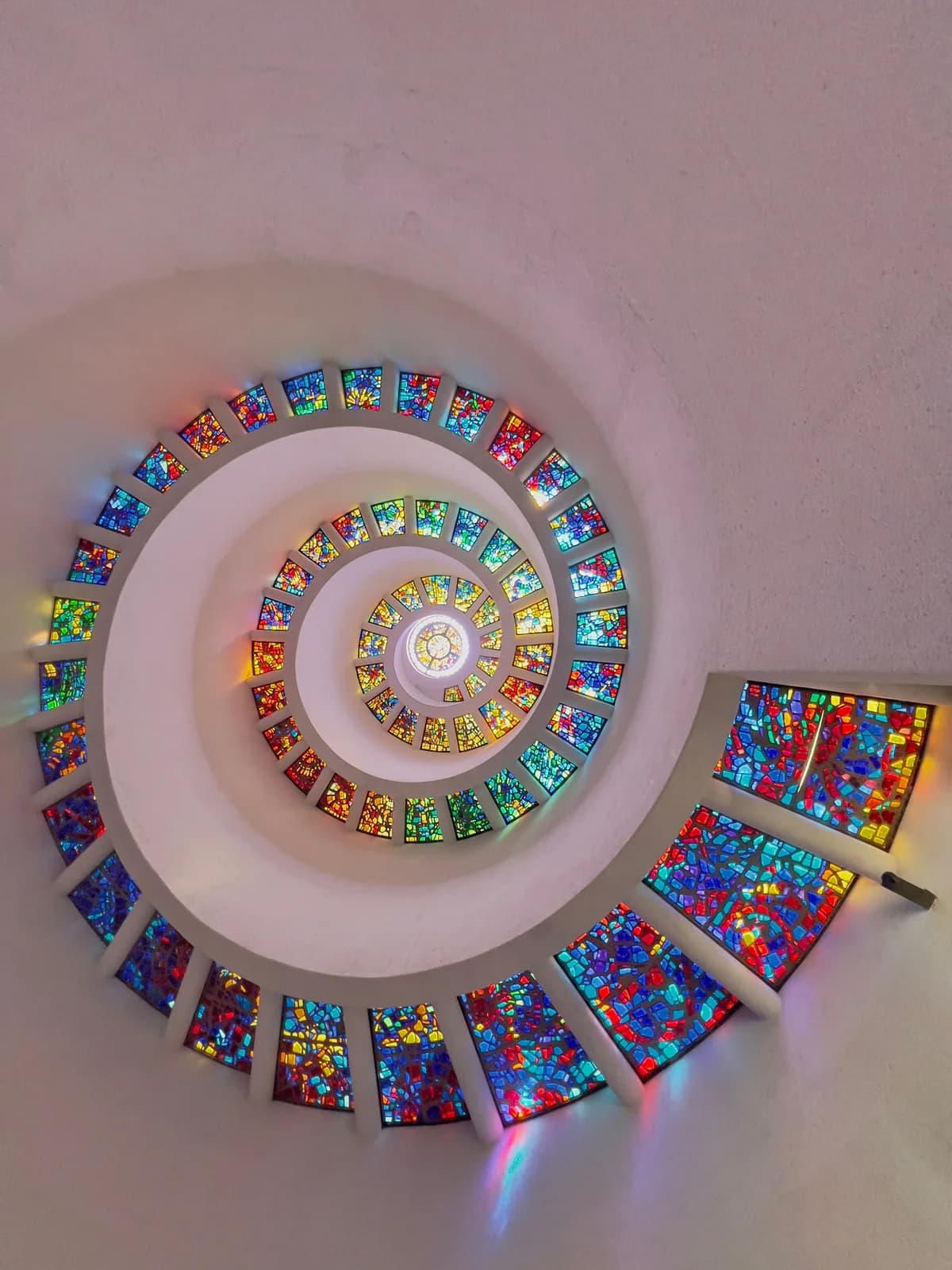 Colorful spiral stained-glass ceiling, fine art photograph by Nancy Pierce